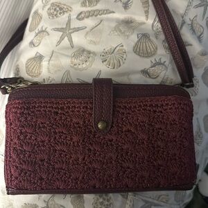 NWT, The Sak crossbody or wristlet hand crocheted, wine color, not brown.